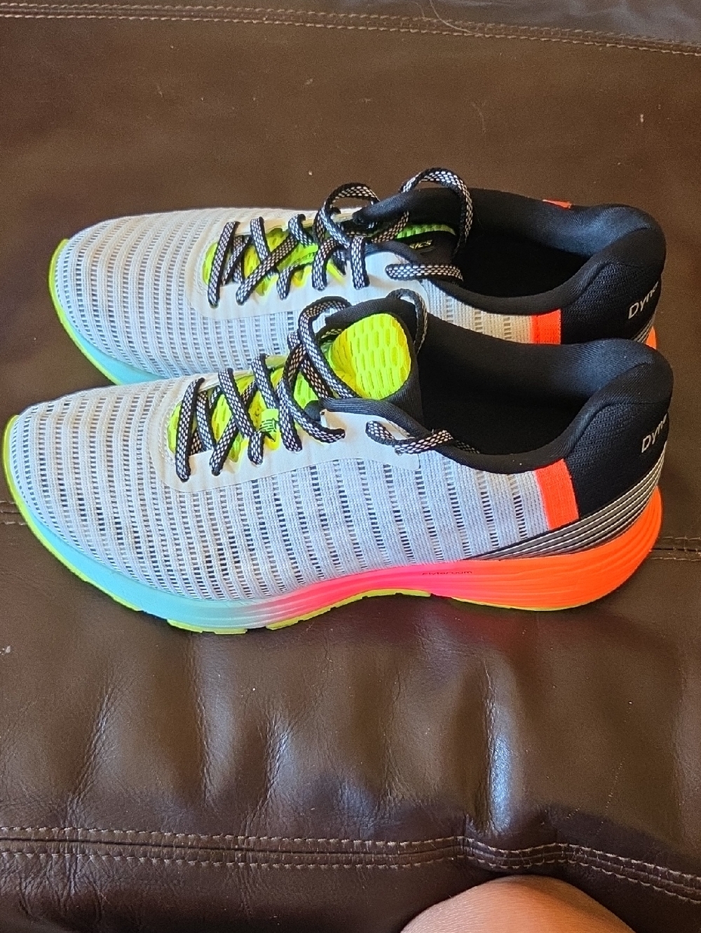 Asics Women's Dynaflyte 3White Running Shoes with Neon Yellow and Orange Accents